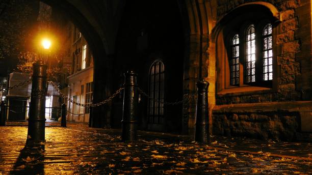 istock Empty Cobbled Street in London at Night 1667614476