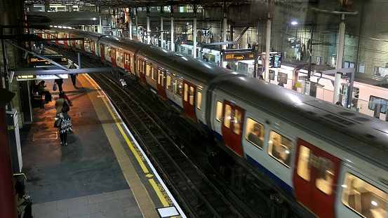 London Tube Trains Arrive and Departure from Underground Station