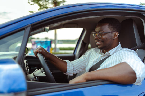 istock African American male driver in car 1667645659