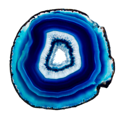 A slice of  blue agate crystal  on white background