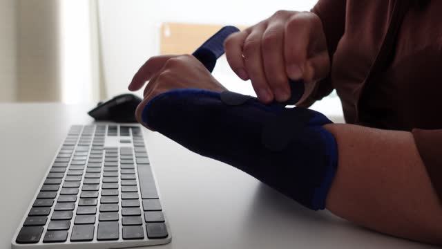 Injured Hands at Work in the office