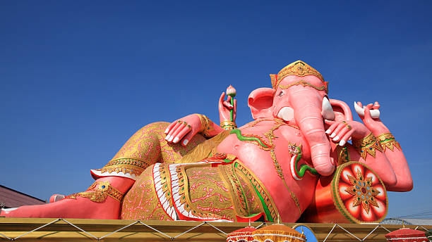 istock Big pink Ganesha against blue sky 166766562
