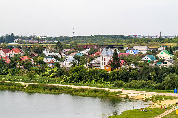 istock Village by lake and railway 166767020