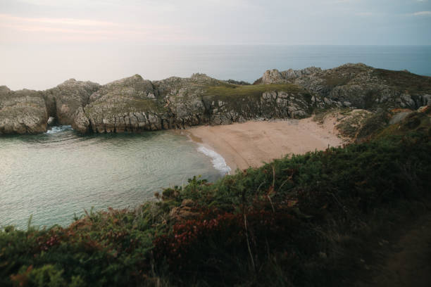 istock Somocuevas beach in Liencres, Spain 1667670804