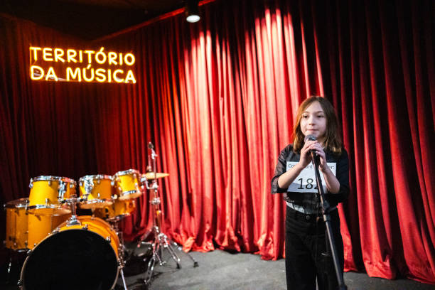 istock Girl singing in a music contest 1667683886