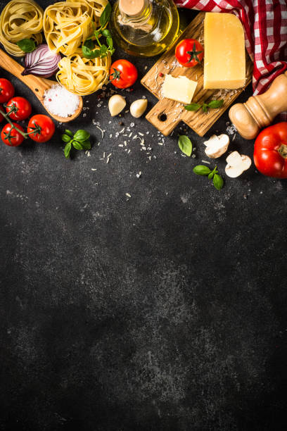istock Italian food background at white bkitchen table. 1667683893