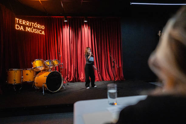 istock Girl singing in a music contest 1667685003