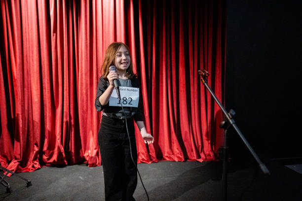 istock Girl singing in a music contest 1667685007
