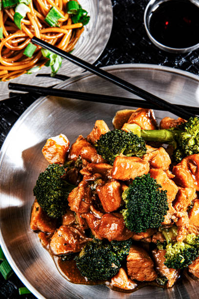 istock Chinese food with broccoli, fresh vegetables and nudle 1667685563