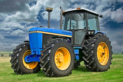 Large Blue Tractor on a Farm