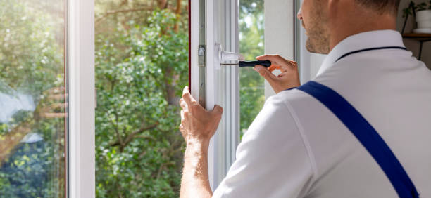 istock worker installing plastic PVC window handle. maintenance and repair. banner with copy space 1667688925