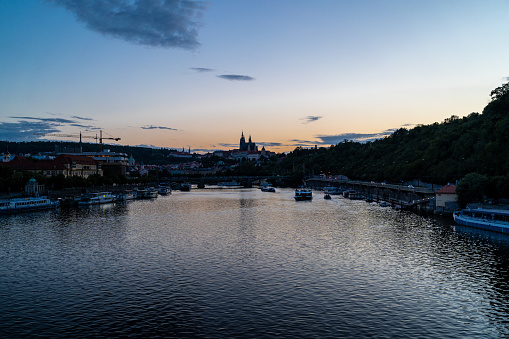 View of Prague Castle from the Vltava river at sunset