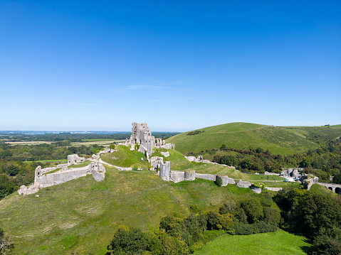 Mediaeval Corfe Ruins with Poole in distnace