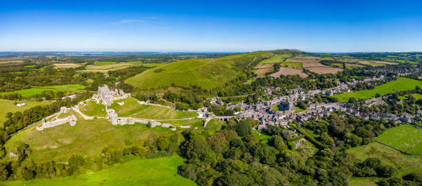 Corfe ruins and the village of Corfe in Dorset