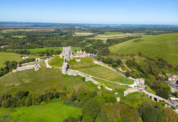 Mediaeval Corfe Ruins with Bournemouth in distance