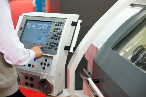 Man Working At Programmable Machine Stock Photo - Download Image Now ...