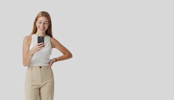 istock Young woman connecting with her phone 1667718504