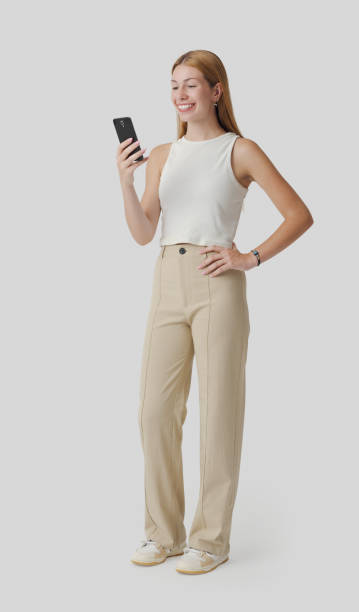 istock Young woman connecting with her phone 1667728844