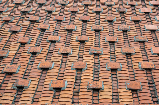 Pattern of red or brown tiles for the roof of the house