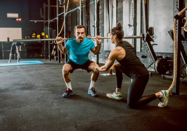 istock a female personal trainer gives classes at the gym 1667772881