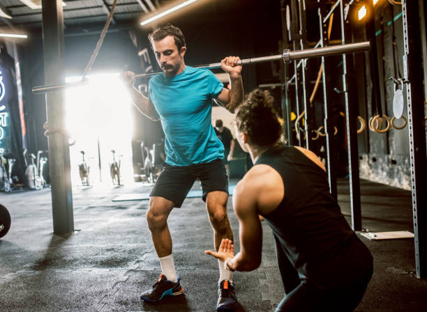 istock a female personal trainer gives classes at the gym 1667773588