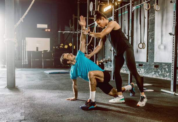 istock a female personal trainer gives classes at the gym 1667774132