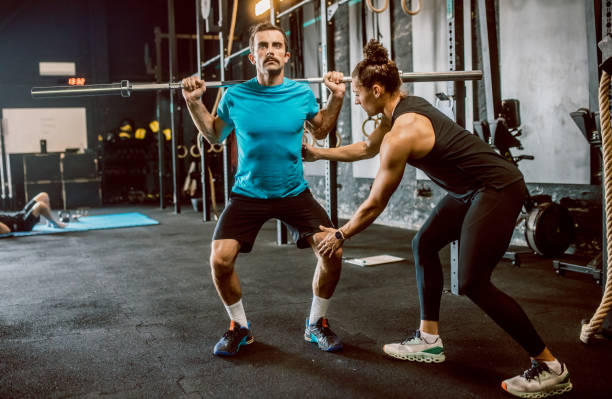 istock a female personal trainer gives classes at the gym 1667775688
