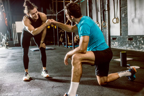 istock a female personal trainer gives classes at the gym 1667777284