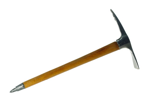 old metal ice-axe  on white background