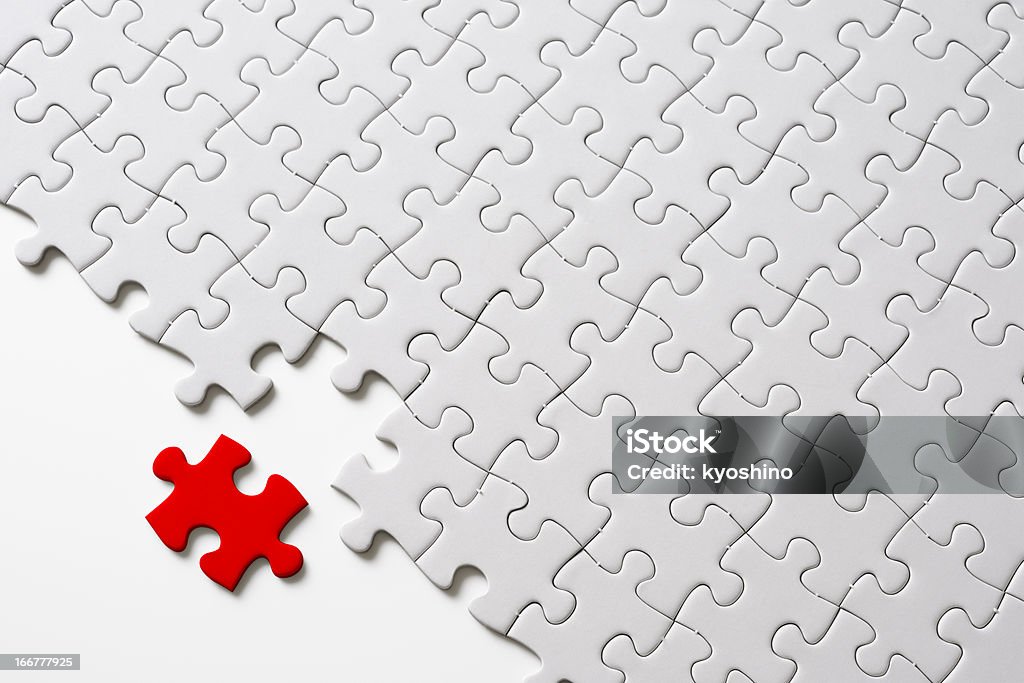 レッドとホワイトのジグソーパズル背景に白色 - パズルのロイヤリティフリーストックフォト