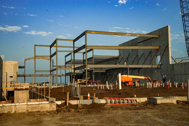 istock Large concrete and steel commercial building under construction. 1667788481