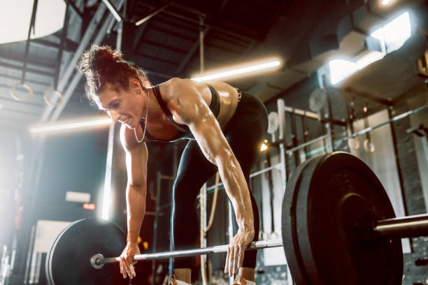 istock young woman in cross training gym 1667789545