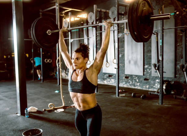 istock young woman in cross training gym 1667790118