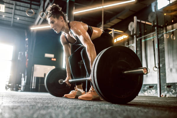 istock young woman in cross training gym 1667792294