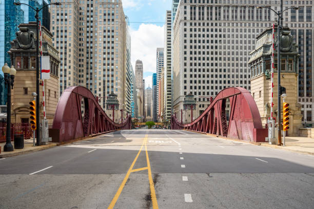 istock Empty street over a bascule bridge in downtown Chicago 1667805765