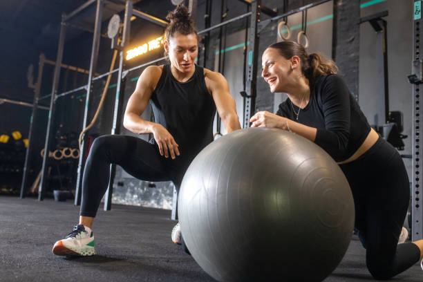 istock a female personal trainer gives classes in the gym 1667808468