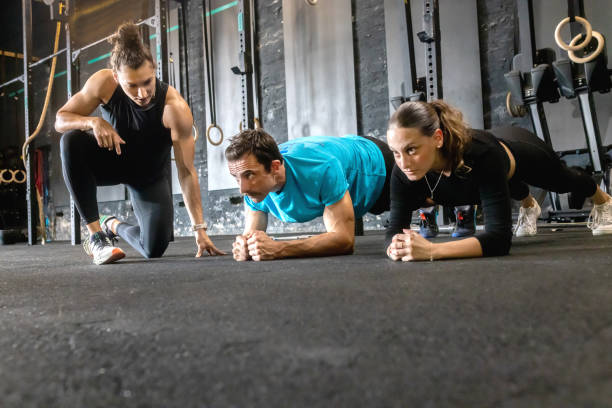 istock a female personal trainer gives classes in the gym 1667808473