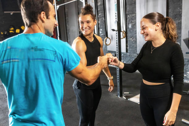 istock a female personal trainer gives classes in the gym 1667808997