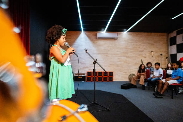 istock Girl singing in a music contest 1667838864