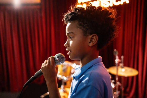 Boy singing in a music contest