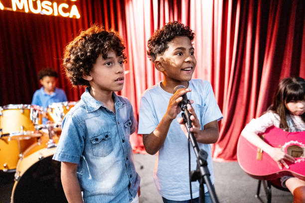istock Boys singing in a music school 1667873551