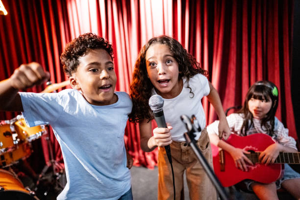 istock Children singing in a music school 1667873559
