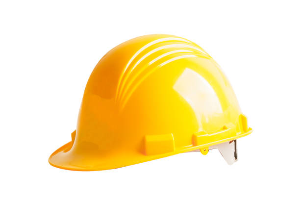 istock Yellow helmet isolated on white background with clipping path, protect to safety for engineer in construction site. 1667874227