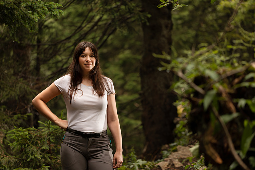 Portrait of a young woman in forest