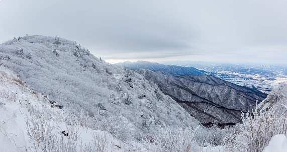Snow-capped Deogyusan mountains on a clear day  in winter, South Korea.