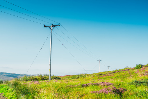 Electricity Pole on a Rugged Landscape at Scotland