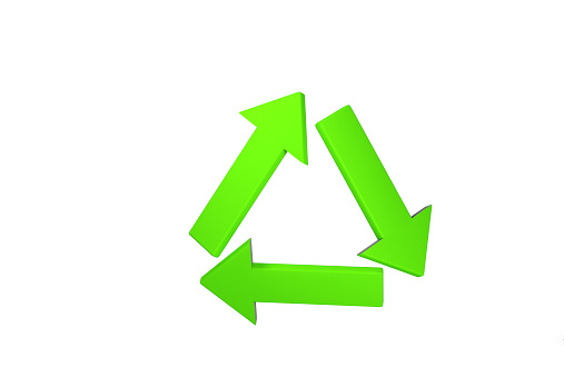 Green recycle symbol on cardboard