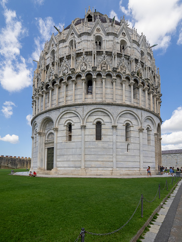Pisa, Italy - July 02 2023: Pisa Baptistery of St. John. This is a Roman Catholic ecclesiastical building. Construction started in 1152. Pisa is a city and comune in Tuscany.