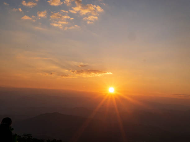 istock golden sky sunrise dramatic beautiful landscape mountain. Dawn sky gold dusk time cloudscape with sunlight. Dramatic sunset over mountain landscape. Beautiful landscape foggy hills twilight time 1667985164