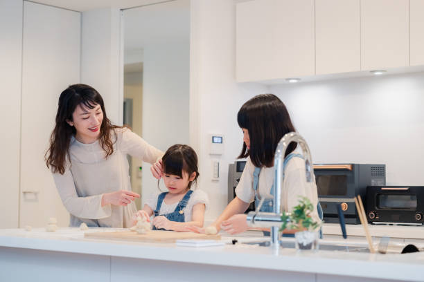 istock Children cooking with their mothers 1667989577